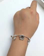Silver charm bracelet