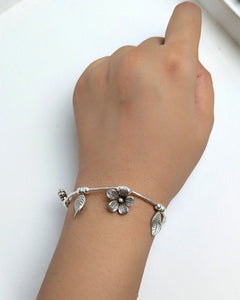 Silver charm bracelet