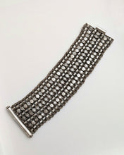 Broad silver bracelet