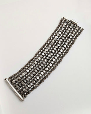 Broad silver bracelet