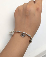 Silver charm bracelet