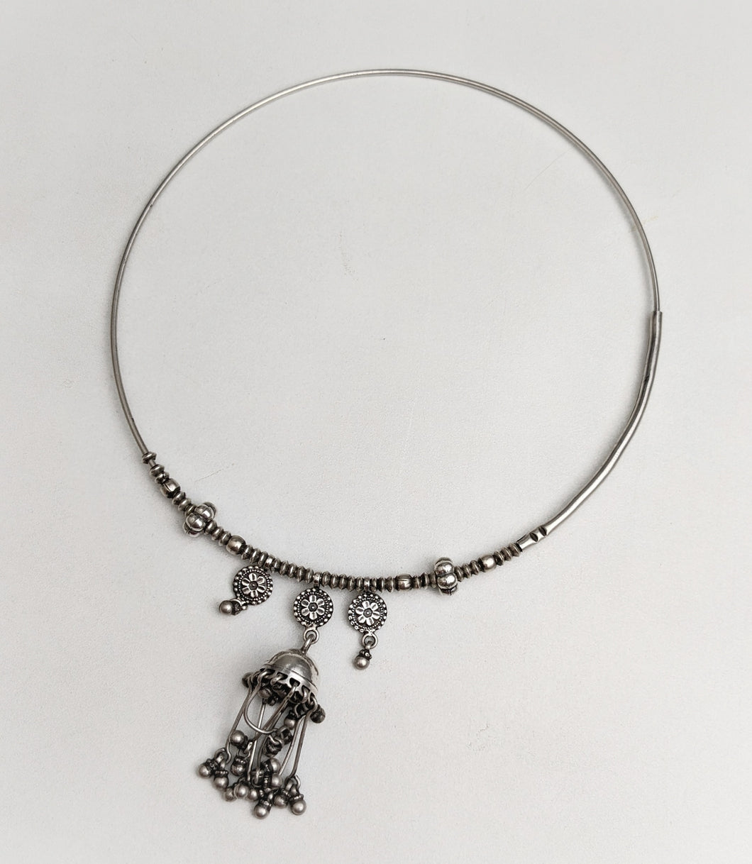 Silver hasli with ethnic ornamentation