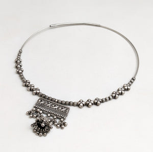 Silver hasli with ethnic ornamentation