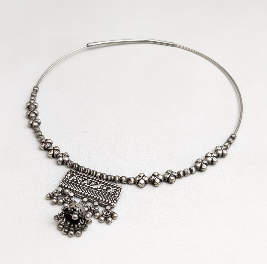 Silver hasli with ethnic ornamentation