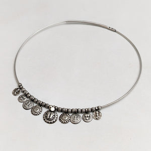 Silver hasli with ethnic ornamentation