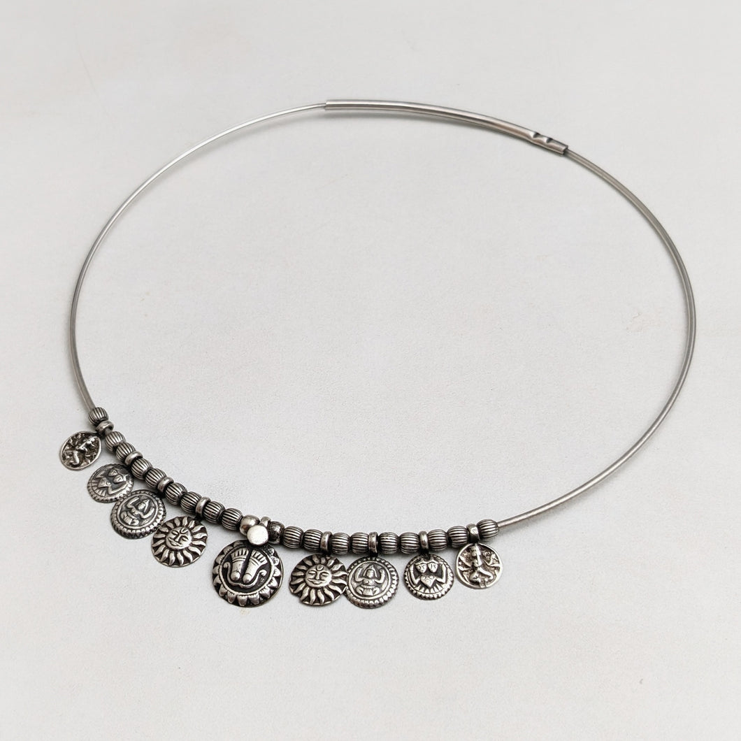 Silver hasli with ethnic ornamentation
