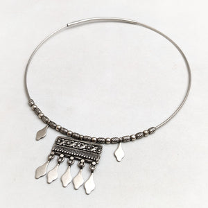 Silver hasli with ethnic ornamentation