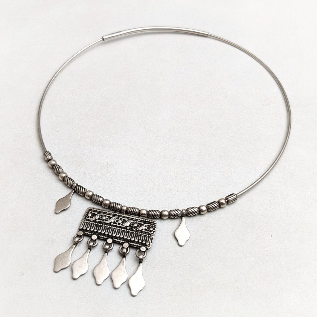 Silver hasli with ethnic ornamentation