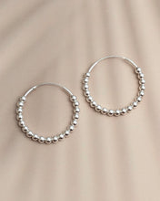 Silver ball hoop earrings