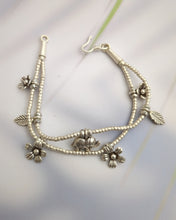 Silver charm bracelet
