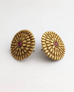 Temple stud with pink stone