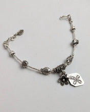 Silver charm bracelet