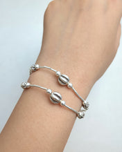Silver charm bracelet