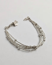 Silver charm bracelet