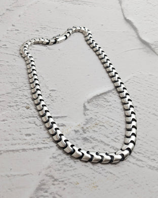 Curved cuban chain