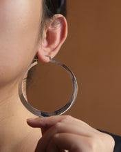 Flat silver hoop earrings