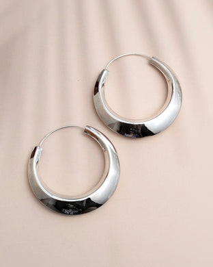 Silver hoop earrings with a slant