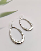 Oval silver drop earrings