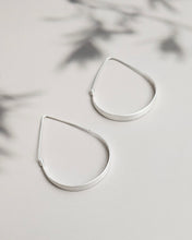 Modern teardrop Silver hoop earrings
