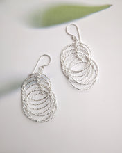 Layered silver earrings