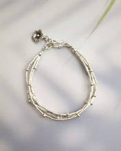 Silver charm bracelet