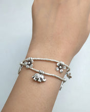 Silver charm bracelet
