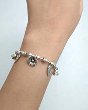 Floral charm bracelet