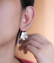 Silver floral earrings with gold tipped buds