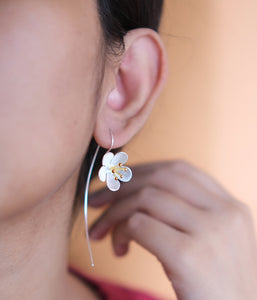 Silver floral earrings with gold tipped buds