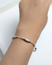 Silver charm bracelet