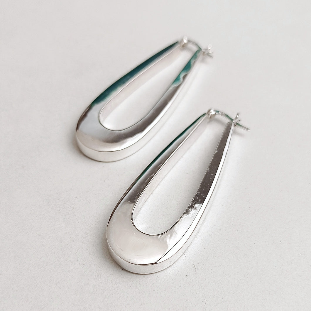 Elongated hoop earrings