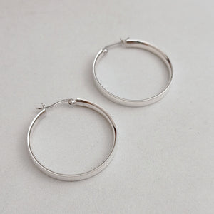 Flat silver hoop earrings