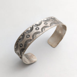 Silver cuff with Navajo motifs