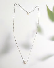 Single pearl necklace