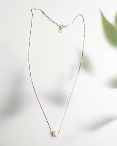 Single pearl necklace