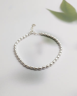 Elliptical bead bracelet