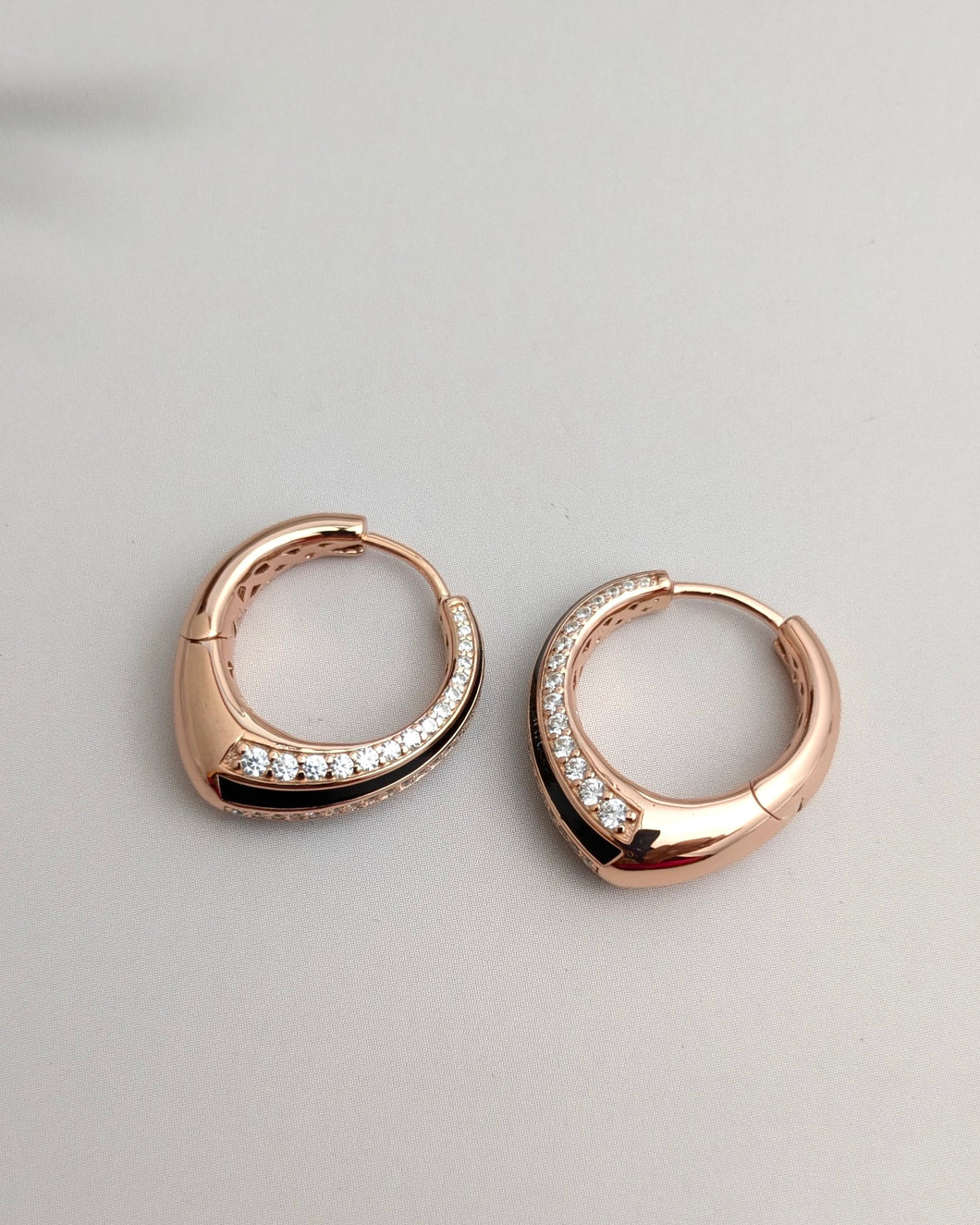 Rose gold hoops with cz and black enamel