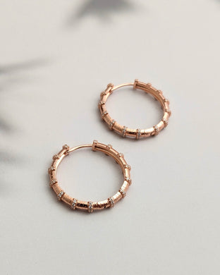 Rose gold hoops with cz