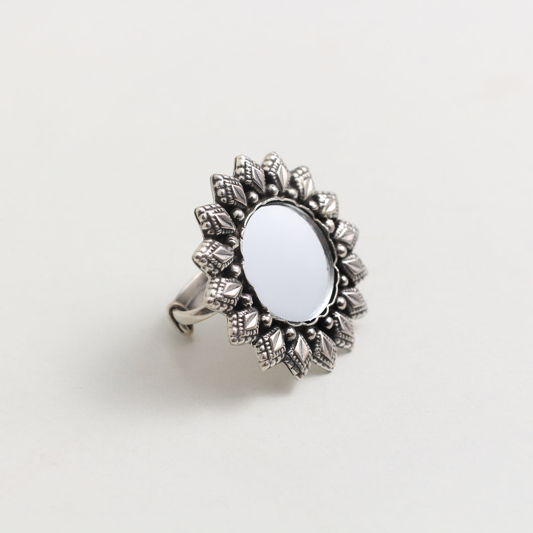 MIRROR RING WITH SILVER EMBOSSING AROUND IT