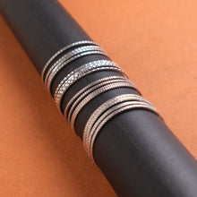 SILVER BANGLE WITH GEOMETRIC DESIGN