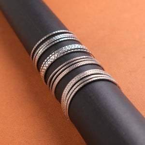 SILVER BANGLE WITH GEOMETRIC DESIGN