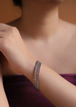 SILVER BANGLE WITH GEOMETRIC DESIGN