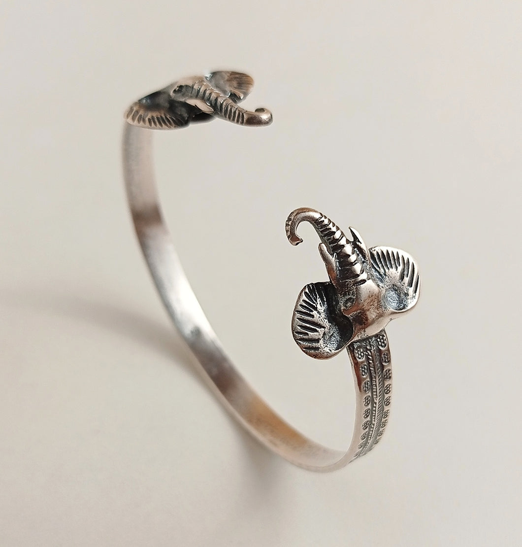 SILVER CUFF WITH ELEPHANT MOTIFS