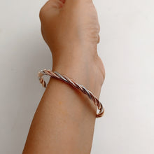 BRAIDED ROSE GOLD AND SILVER BRACELET